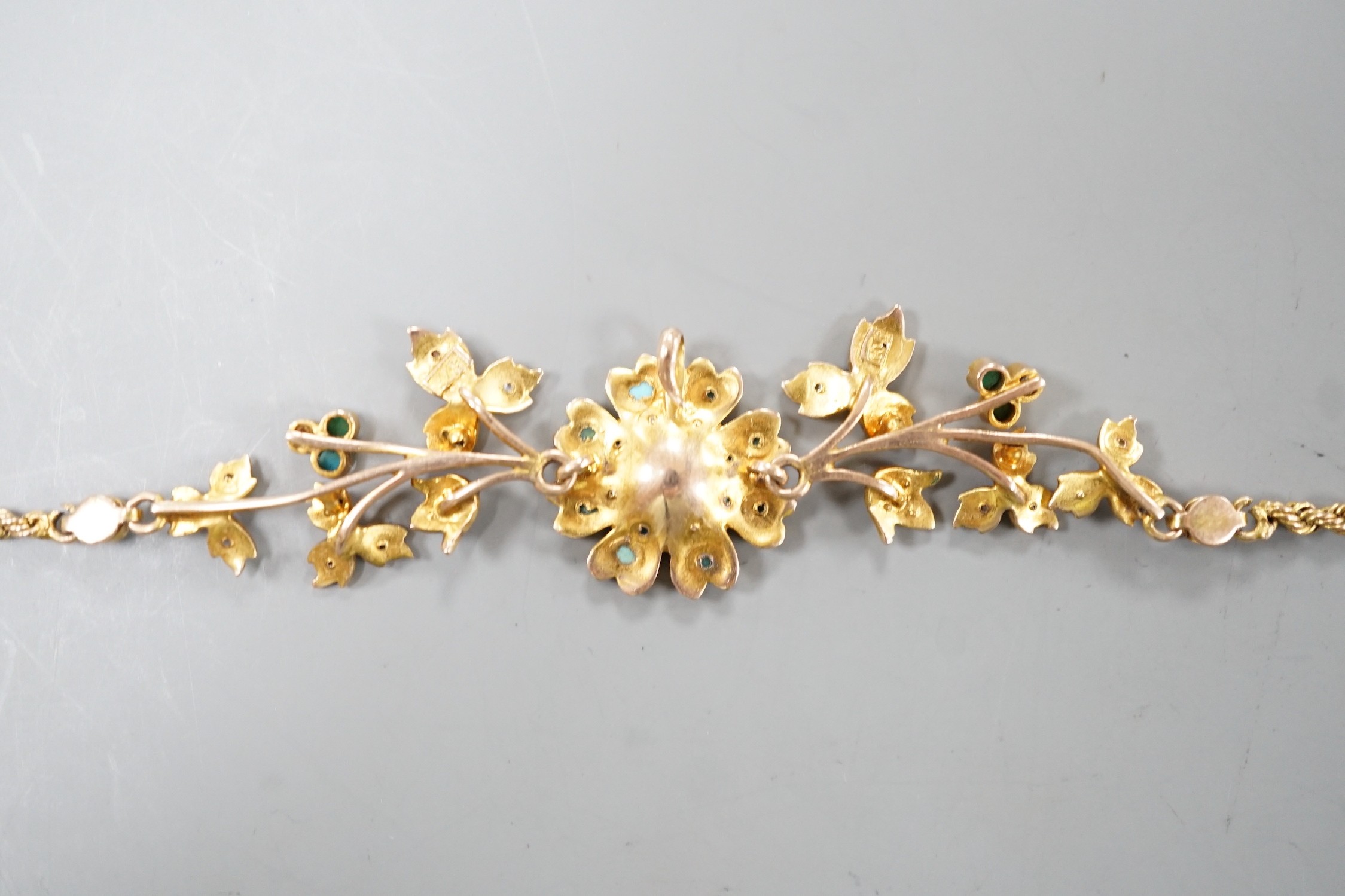 A 375 yellow metal, seed pearl and turquoise cluster set necklace, with rope twist chain, 37.5cm, gross weight 7 grams, lacking central drop.